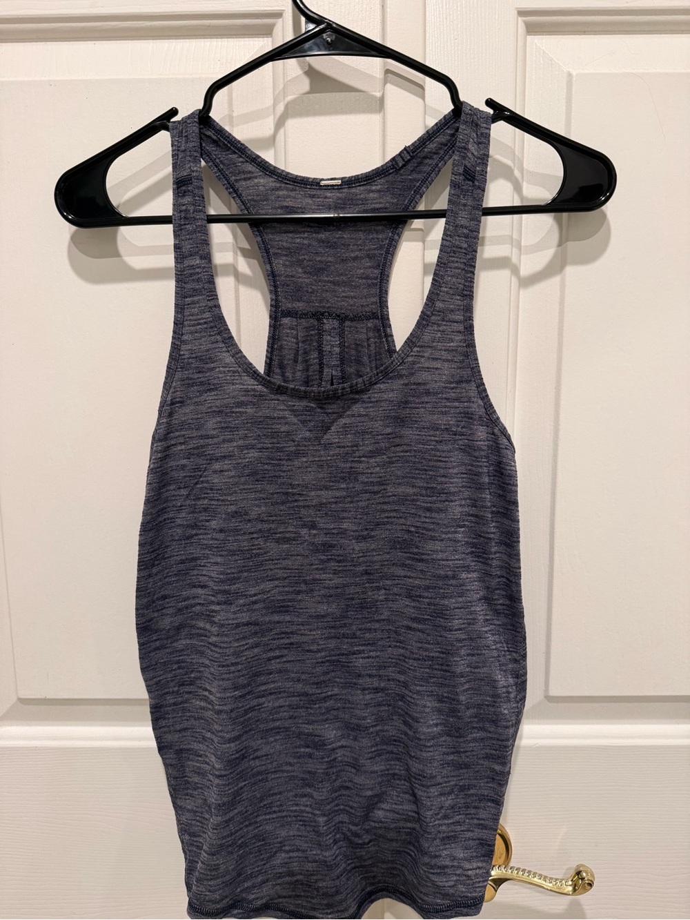 Lululemon women’s navy heathered tank top size 4 cut outs on back, can tie botto